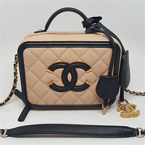 black and beige chanel bag